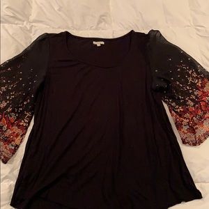 Maurices black top with floral sheer sleeves